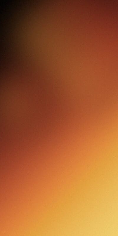 A blurred gradient with warm colors transitioning from dark brown at the top to light yellow at the bottom.
