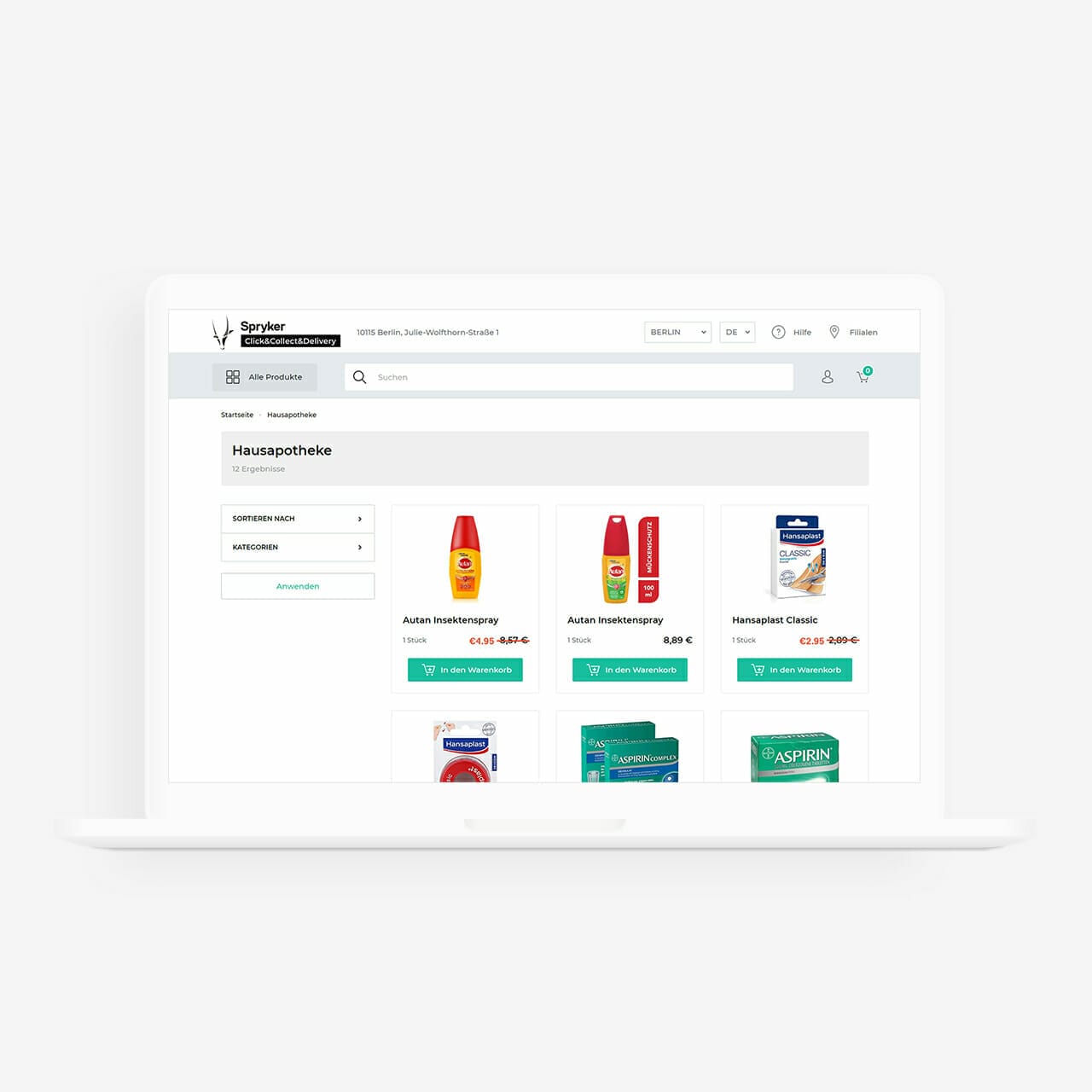 A laptop displaying Oharma's online store webpage with various pharmacy products, including insect repellent and aspirin, ready for purchase.