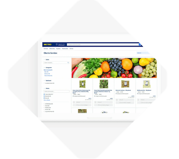 A computer screen displaying an online grocery store homepage showcases the commerce benefits of various fruits and vegetables for sale.